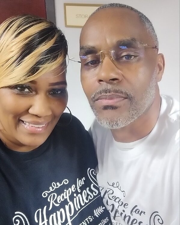 Sherita and David Samuels wearing their Recipe for Happiness t-shirts